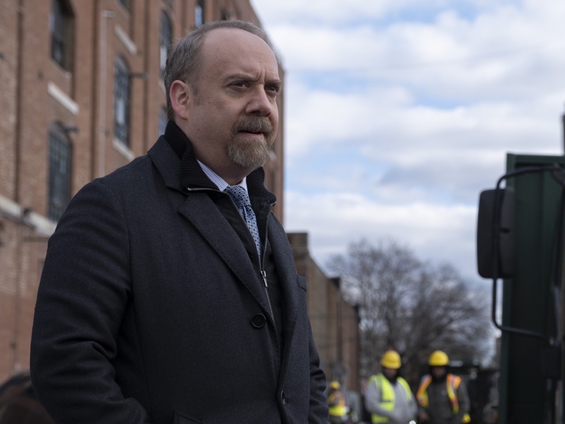Chuck Rhoades from Showtime's Billions standing outside in a jacket