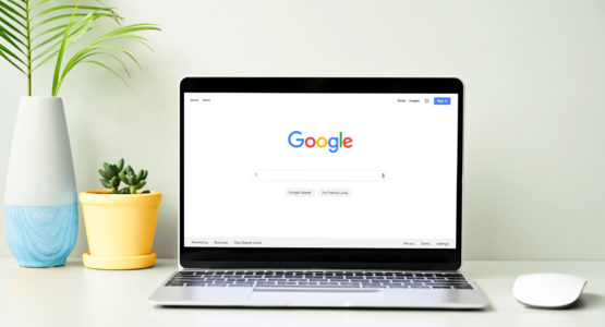 Google search screen on a laptop sitting on a desk