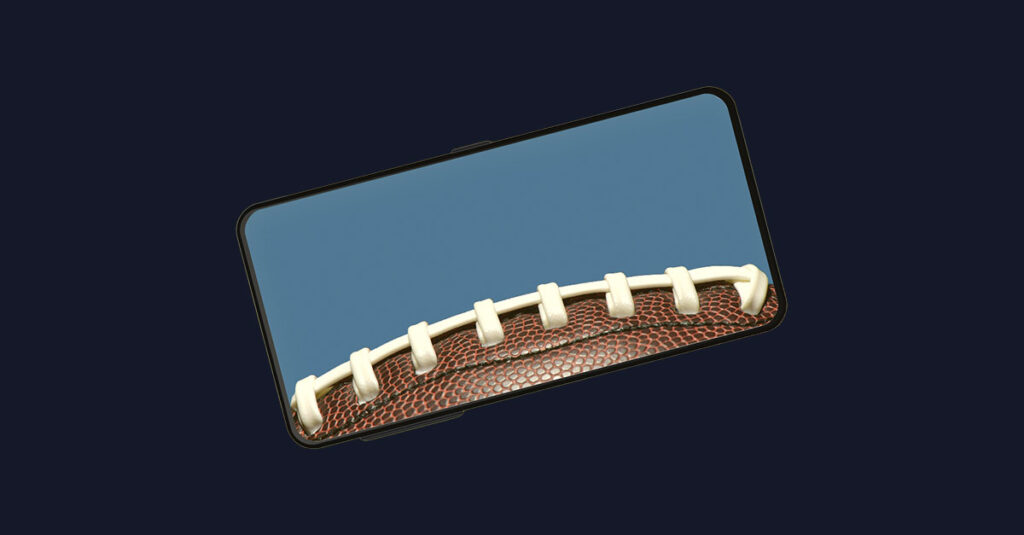 A football on a cell phone screen