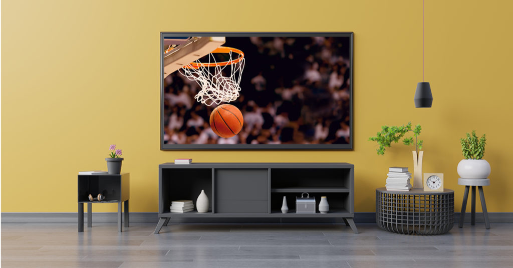 Basketball game playing on a television