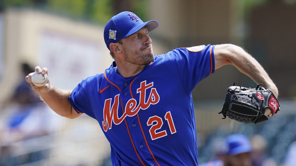 New York Mets' Max Scherzer pitches in the first inning of a spring training baseball game against the Miami Marlins, in Jupiter, Fl